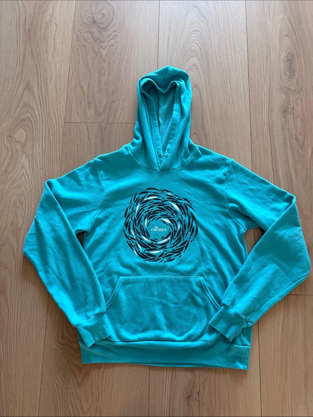 The Chosen teal against the current  Hooded Sweatshirt